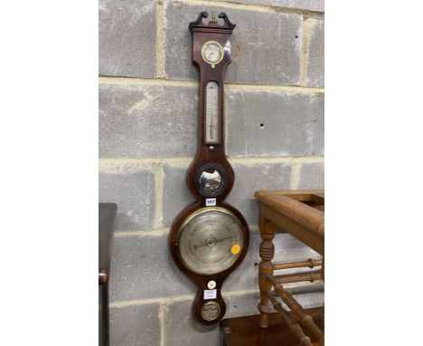 An early 19th century mahogany wheel barometer marked Beffi, Hastings, height 96cm