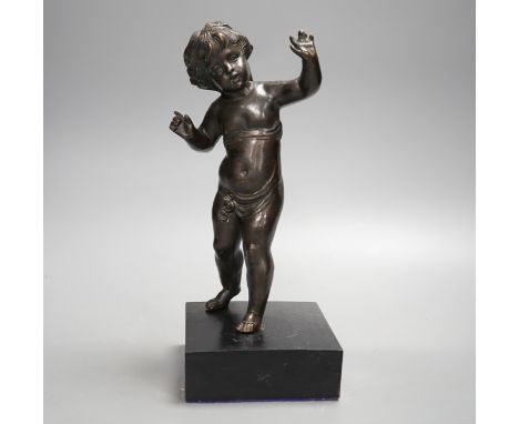 A 20th century bronze putto on wooden stand 29cm including stand