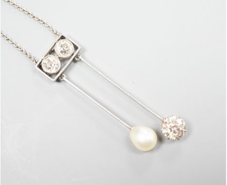 A 1940's white metal (probably platinum), three stone diamond and single stone teardrop shaped pearl set double drop pendant 