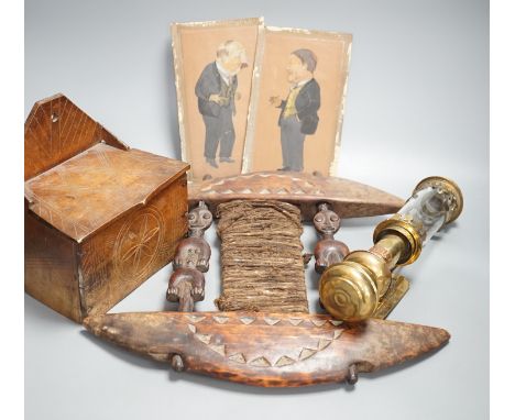 African carved wood instrument, chip carved beech box, a GWR  brass wall lamp and a pair of oil portraits of H Belloc and HG 