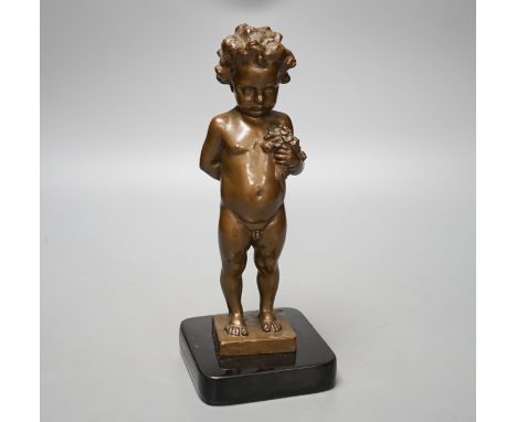 A bronze of a putto holding flowers, signed ‘M.Müller’ 25cm