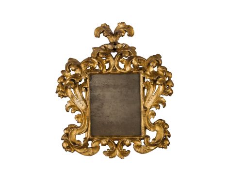 impianto squadrato ornato da ricco decoro a cartouche fogliacea; usure, cadute e mancanze nella doratura, restauricm 65X55Luc