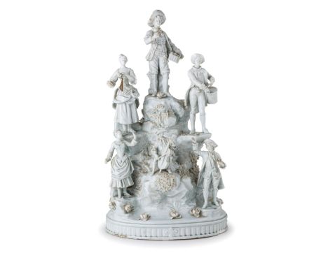 raffigurante figure su un'alta roccia; usure, mancanzeMarca di fabbricaAlt. cm 51,5, larg. cm 29A CERAMIC GROUP, 19TH-20TH CE