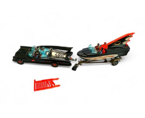 Corgi Batman Batmobile No. 267 with early red Bat logo hubs, grey aerial, Batman and Robin figures and rockets, plus Bat Boat