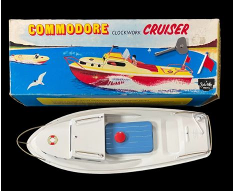 Sutcliffe Commodore tinplate clockwork boat with key and unattached windscreen, flag and mast, generally excellent to good pl