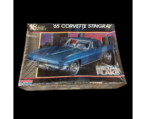 Monogram 1/8th scale 1965 Corvette Stingray (metalflake edition) No. 2613, unmade and unpainted plastic model kit, generally 