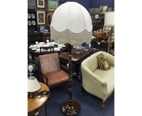 MAHOGANY FLOOR LAMP, with a fringed shade