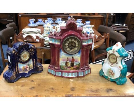 EARLY 20TH CENTURY CONTINENTAL MANTEL CLOCK, with ceramic casing, 38cm high, along with two others (3)