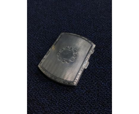 SILVER RECTANGULAR CIGARETTE CASE, contained in an engine turned case with blank reserve, Birmingham 1924