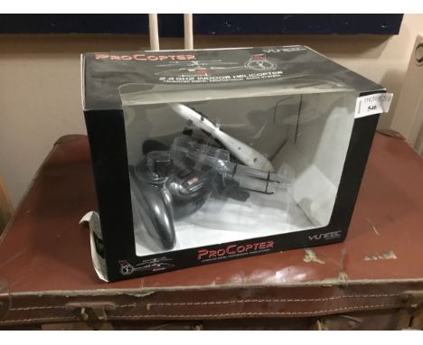 YUNEEC PROCOPTER 2.4 GHZ INDOOR HELICOPTER, in box, along with two Unimax model U.S. military helicopters , each in box (3)