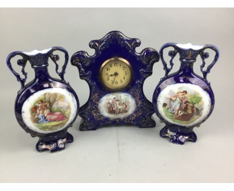 VICTORIAN CERAMIC CLOCK GARNITURE, comprising clock and two vases, the clock 27cm high