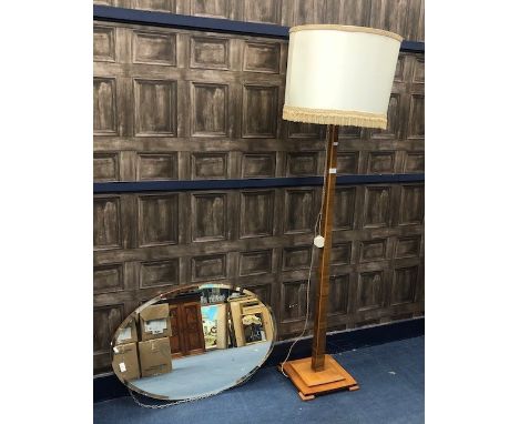 OAK FLOOR LAMP, 180cm high, along with an oval bevelled wall mirror (2)