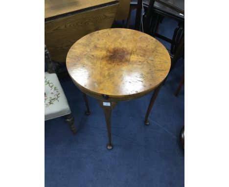 WALNUT CIRCULAR OCCASIONAL CARD TABLE, with reversible top, baise lined to one side, 61cm diameter