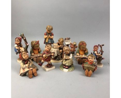 LOT OF GOEBEL HUMMEL FIGURES OF CHILDREN, including children modelled with books and in trees (11)