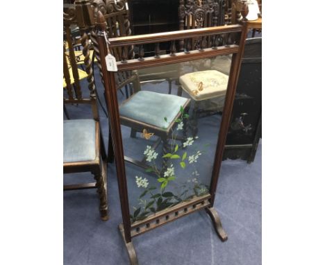 VICTORIAN FIRESCREEN, the painted glass panel depicting butterflies and flowers within railed borders and on curved supports,