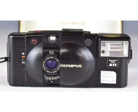 Olympus XA2 35mm compact camera with F-Zuiko 1:3.5 f=35mm lens, in original hard case