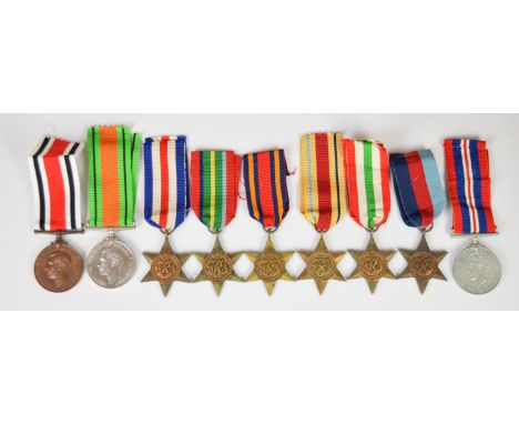 Eight WW2 medals comprising 1939/1945 Star, France &amp; Germany Star, Africa Star, Italy Star, Burma Star, Pacific Star, War