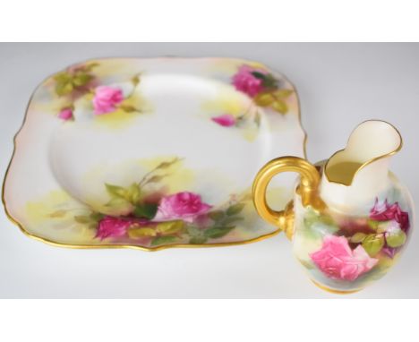 Royal Worcester cake plate, diameter 21cm and a flatback jug decorated with roses, height 11cm&nbsp;