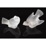 Two Lalique frosted glass sparrow paperweights, each signed 'Lalique France', largest 13cm long.