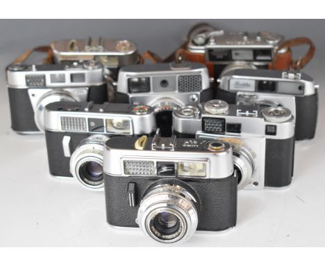 Eight 35mm film cameras comprising Voigtlander Vitomatic II, two Vito CLR, Yashica EE, Kodak Retinette IB, Franka, Super Bald