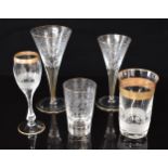 Five pieces of Moser glassware including three Maharani pattern drinking glasses with engraved