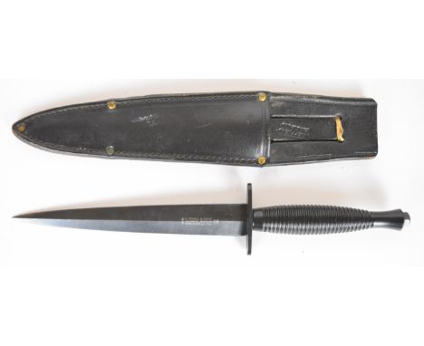 Fairburn Sykes pattern fighting knife marked Nowill & Sons and cross keys to 17cm double edged blade, with scabbard. PLEASE N