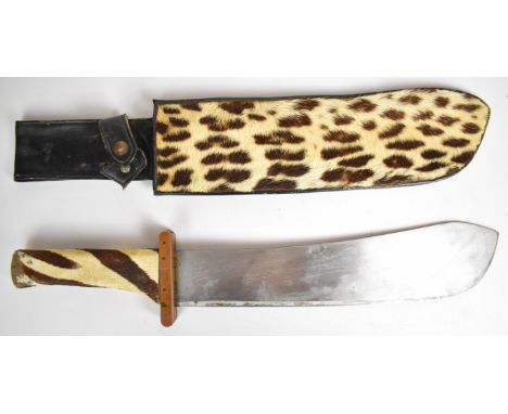 Marindale 'machete' style knife, No 247 to 33.5cm blade, copper cross guard, skin covered grip and part skin cover to sheath.