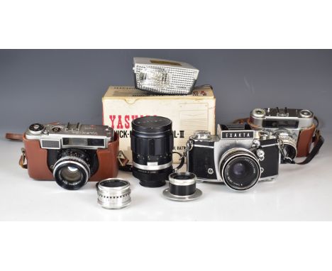 Collectable 35mm cameras comprising Exakta with Carl Zeiss Jena Tessar 2.8/50 and Soligor 135mm 1:2.8 lenses, Braun Paxette w