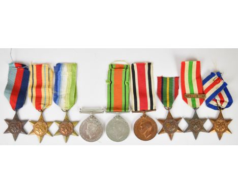 Eight WW2 medals comprising 1939/1945 Star, France &amp; Germany Star, Africa Star with clasp for 8th Army, Italy Star, Atlan