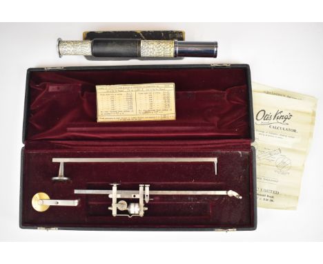 Cased Bowen &amp; Company planimeter together with an Otis King spiral slide rule