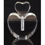 Heart shaped clear glass shop display or advertising perfume or scent bottle with matching
