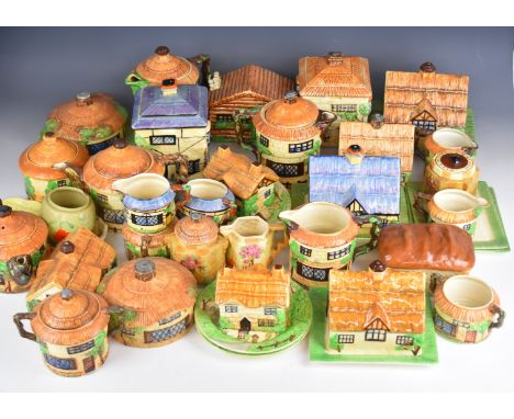 Large collection of Beswick retro / kitsch cottage / sundial and similar ware including multiple teapots, biscuit barrels, ex