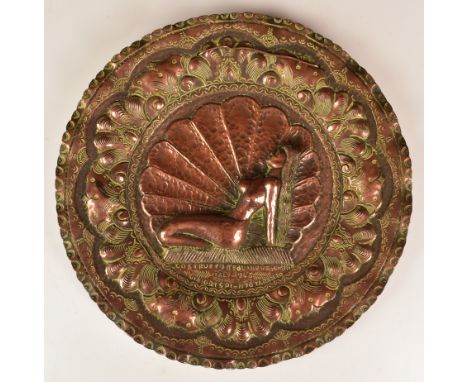 WW2 North Africa and Italy campaign interest copper trench art wall plate, depicting a nude lady with shell behind and marked