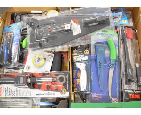 Large quantity of mainly unopened sea fishing accessories in two trays, including Rapala filleting knives, scales, line spool