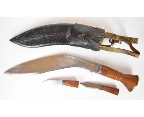 WW2 era kukri knife with wooden grip, 31cm blade, leather scabbard with belt attachments and karda and chakmak. PLEASE NOTE A