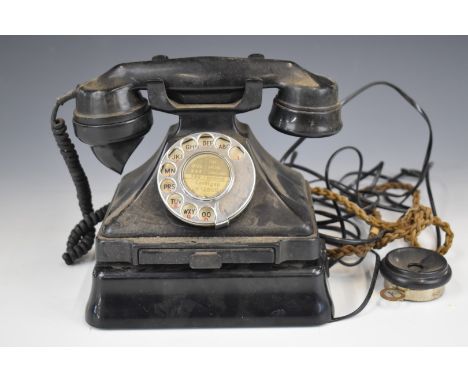Vintage black Bakelite telephone with additional wall box, marked to underside of main phone FWR 55