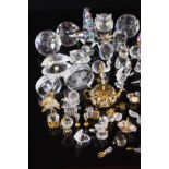 Approximately fifty Swarovski Crystal Memories and similar glass items, mainly animals but with some