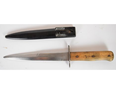 Possible WW1 fighting knife stamped S to ricasso with wooden grips, 16cm blade and metal scabbard. PLEASE NOTE ALL BLADED ITE