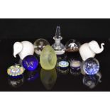 Eleven glass paperweights including Perthshire scent / ink bottle, Caithness Dewdrop Orchid,