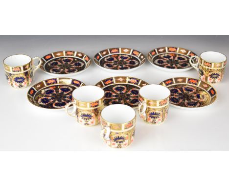 Royal Crown Derby Imari six saucers and five coffee cans decorated in the 1128 pattern