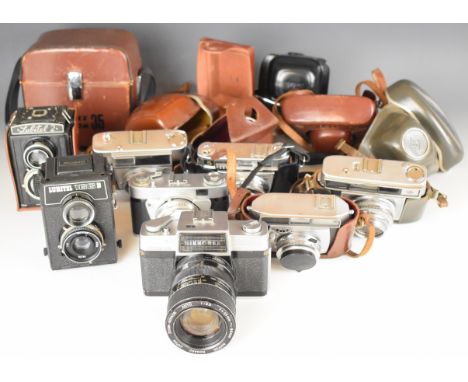 Eight collectable cameras comprising Nikkorex Zoom 35 with 1:3.5 f=43-86mm lens, Lubitel 2 and 166bB TLR cameras, Agfa Super 