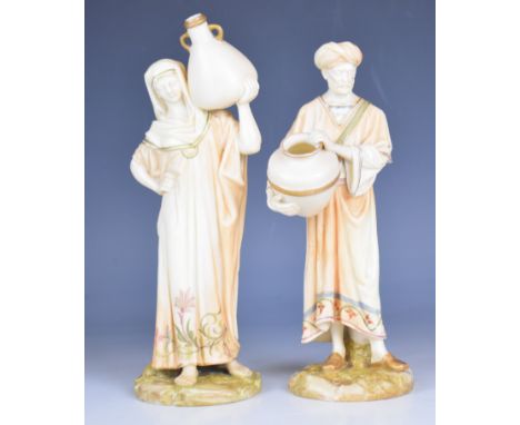 Royal Worcester pair of blush ivory figures of Cairo water carriers, probably designed by Hadley, tallest 24cm