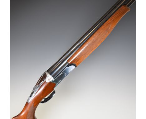 Castellani Star Vega 12 bore over and under shotgun with named lock, chequered semi-pistol grip and forend, sling mounts, sin