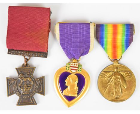 Two United States medals comprising WW1 Victory Medal and Purple Heart (For Military Service), together with a copy Victoria 