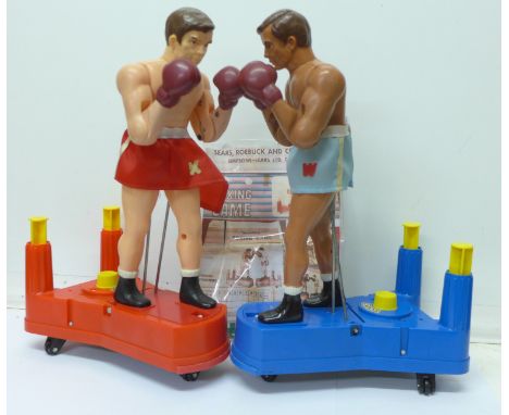 A plastic boxing game, marked made in Singapore