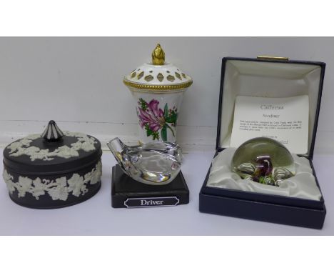 A Caithness Moonflower glass paperweight designed by Colin Terris, boxed, a Wedgwood black Jasperware lidded pot, a glass sha