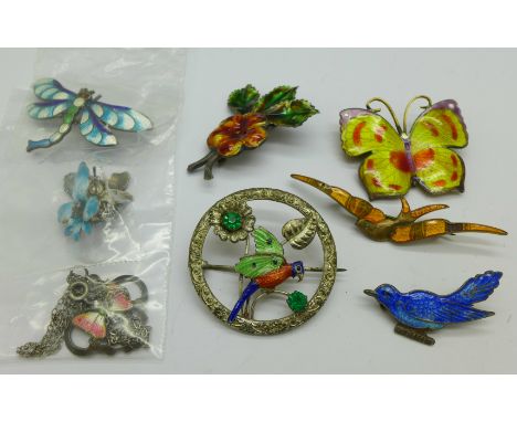 Three silver and enamel brooches including a dragonfly, a silver and pink enamel butterfly pendant, three other enamel brooch