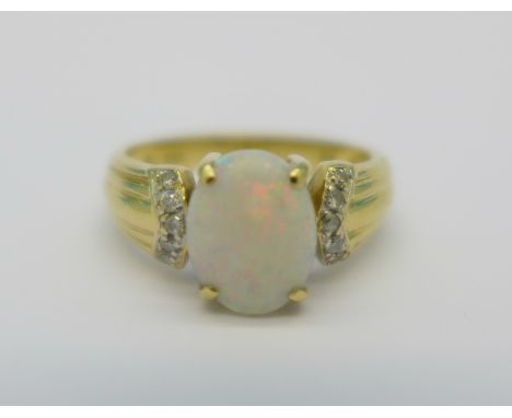 An 18ct gold, opal and diamond ring, 3.3g, L