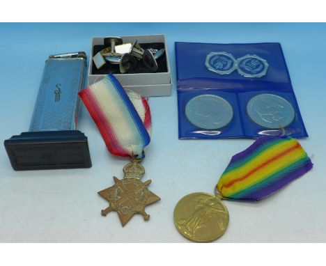 Two WWI medals, a Polo chrome table lighter, three pairs of cufflinks, two commemorative crowns and two 1977 badges, (Star to