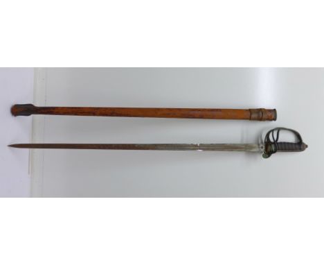 A WWI period Royal Artillery sword with scabbard, blade rusty, a/f